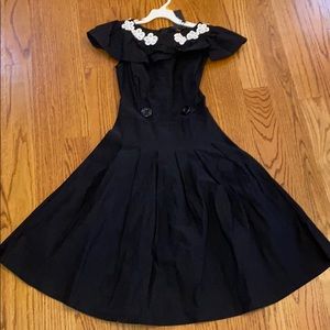 Young Woman’s black dress (with tag)